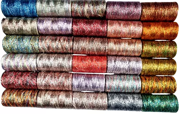Metallic Embroidery Threads Spools – Add Sparkle to Every Stitch Metallic Machine Embroidery Thread ideal for all sort of your embroidery projects. HIGH QUALITY GUARANTEED Suitable for Janome, Yamaha ,Guterman , John Lewis, Juki, Brother , Tajima, PFAFF and many many more It is renowned as durable fast colors. consistency, sheen and brilliance of shades. Its superior strength delivers high sewing productivity in the most demanding applications. An excellent choice for hand or machine embroidery, or any other stitching project. The thread can be used with ANY fabric you can lay your hands on. It has a guaranteed fast colour. Metallic Embroidery Machine Threads are trickier than polyester embroidery threads. Please use Topstitch Needle with larger eye to work with, such as SCHMETZ Topstitch 80/12 or 90/14 size. Adjust the tension of machine, keep the metallic thread coming out smoothly, lower the machine speed under ≤600 speed per stitch. Will prevent the tangled/break issues.